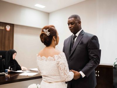 Couple holding hands after their Express UAE marriage