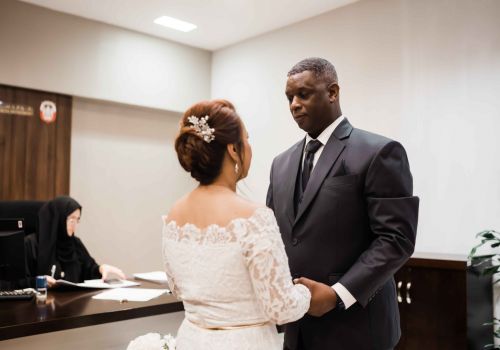 Couple holding hands after their Express UAE marriage